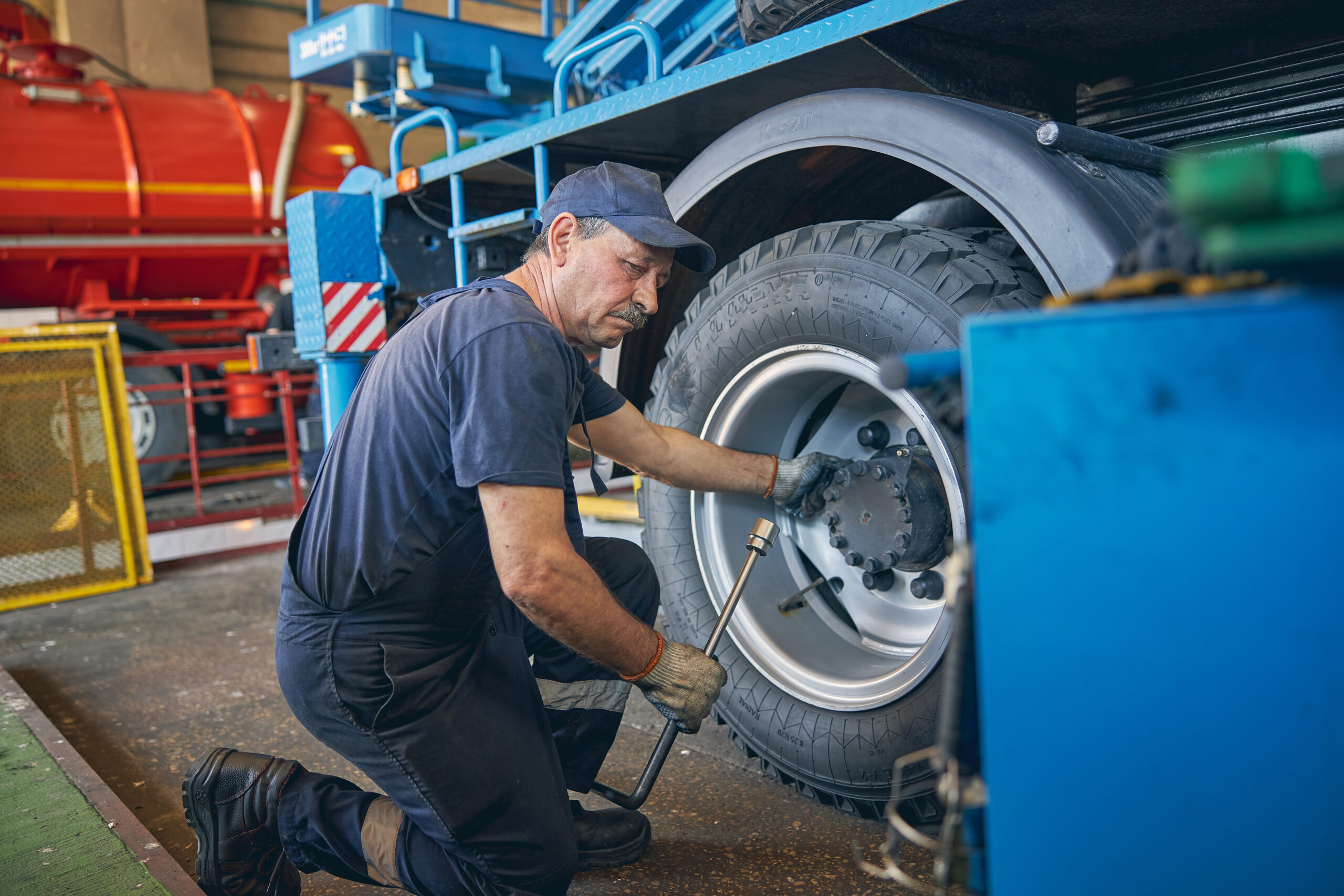 Concentrated male person doing revision of wheel