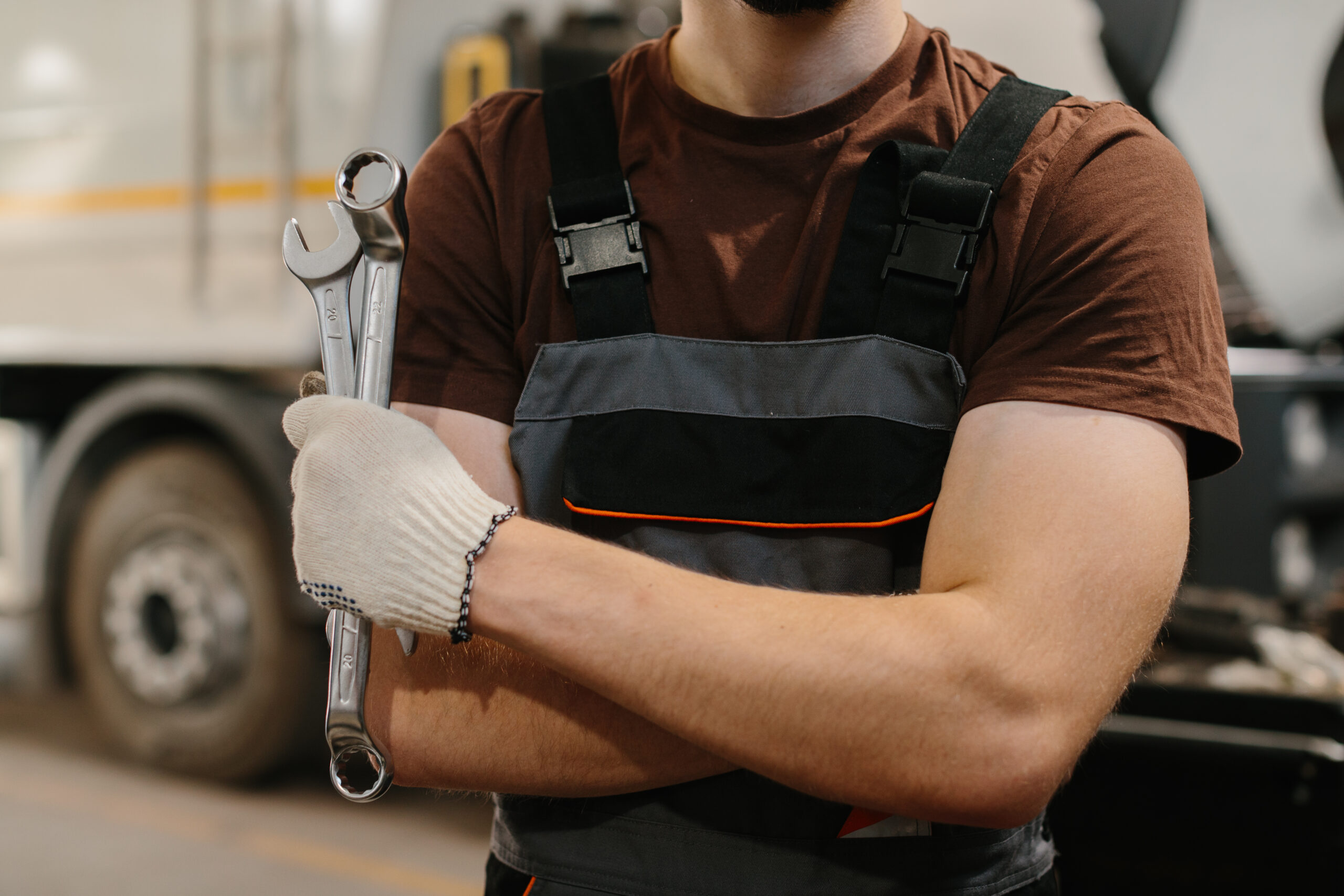 Skilled mechanic working on truck maintenance